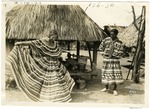 [1927] Cory Osceola Watches a White Woman Modeling Seminole Patchwork Clothing