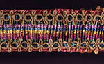 [2001] Textile detail of poinciana pod decorated for Oya