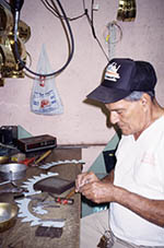Juan Gonzalez in his shop where he makes herramientas (tools)