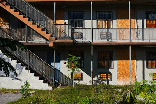 Facade of Closed Down Residential Building on Grand Avenue