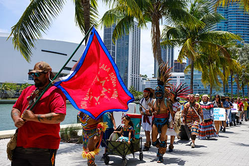 People dressed marching in line