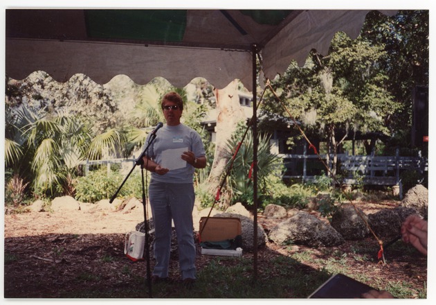 Larry Duemmling reads a poem created by Jessie Freeling 'Met Me at the Bridge' at event in Arch Creek Park, January 1993