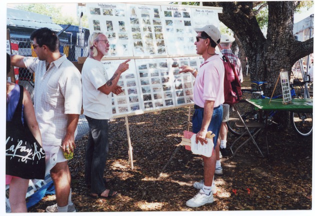 Miami Historian Paul George at a Display of Burnham Neill Postcards