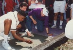 Hip-Hop duo Kid 'N Play and North Miami Councilman, David Caserta, signing onto sidewalk during the release of Class Act