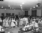 [1953-05-29] W.J. Bryan Elementary 6th grade students in a conga line