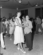[1953-05-29] W.J. Bryan Elementary 6th grade teacher dances with student