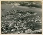[1952-04-12] Aerial view looking west at Surfside, Bal Harbour, Bay Harbor, and North Miami