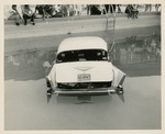 [1958-08-26] Car crashes into Voyager Motel swimming pool - rear view