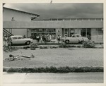 Voyager Motel guests gathered outside of the building to look at a car accident