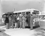 [1954-11-27] North Miami Chamber of Commerce members line up on the bus N.W. 17th Avenue