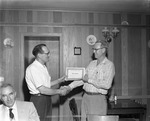 [1956-04-26] John Stratman receives certificates from North Miami Chamber of Commerce