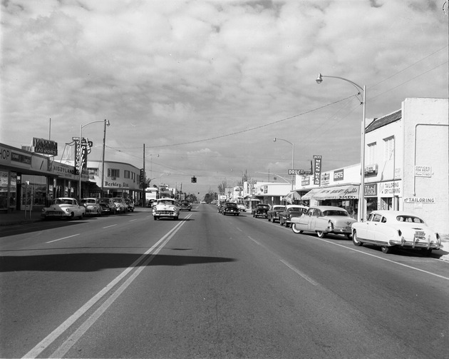 Street view with retail shops along 125th Street and NE 7th Ave in North Miami, Florida