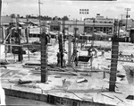 [1963-11-04] City Hall of North Miami under construction view of shops on 8th Avenue