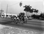 Group of kids riding bikes heading to Keystone Point