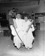 [1954-11-01] Couple wearing ghost costume at the Kiwanis Halloween party