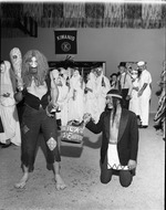 [1954-11-01] Men in costumes at the Kiwanis Halloween Party