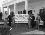 Firefighters and police officers portrayed with the 1959 Coffee Break Safety Program sign