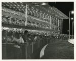 [1961-06-02] Biscayne Kennel Club - crowd by the fence next to the track