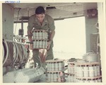 Loading Big Red 1 Alpha (BR1A) Canisters into a UH-1D Helicopter