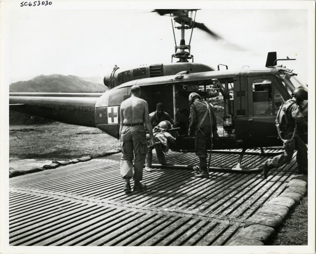Dustoff Crew Removes Wounded Soldier - 