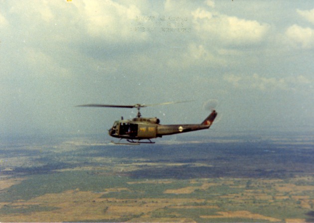 Red 8 helicopter in flight - 