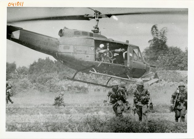 116th AHC troops walk away from helicopter - 