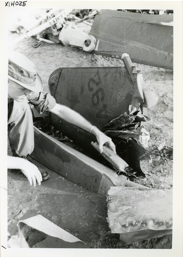 Touching helicopter debris