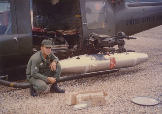 Posing with helicopter, 119th AHC - 