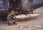 Posing with helicopter, 119th AHC