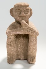 Huetar culture stone figurine squatting man playing the flute