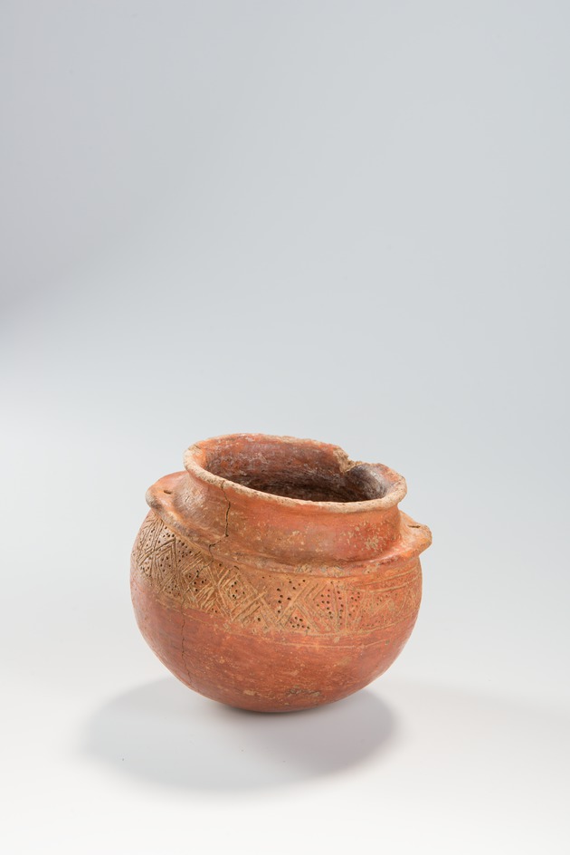 Small irregular reddish ceramic bowl with crude incised and punctate designs - DSC_1260