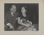 Alberto Bolet sitting next to a young female violinist