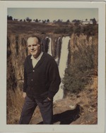 Alberto Bolet in front of a waterfall