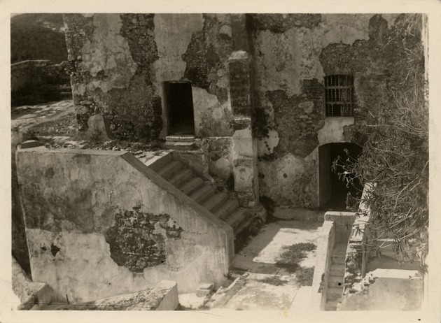 View of interior walls and stairs of Castillo del Morro, Santiago de Cuba after 1932 earthquake - Recto