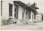 Debris and damage to the exterior of a building in Santiago de Cuba after 1932 earthquake