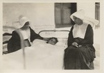 A girl who was seriously ill at the House of Charity under the care of two nuns after 1932 earthquake