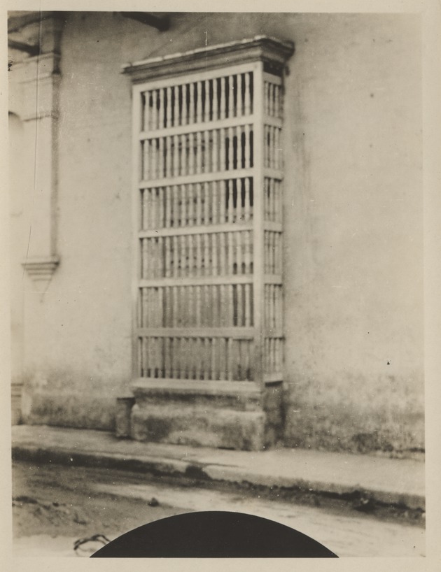 View of barred door, Santiago de Cuba - Recto