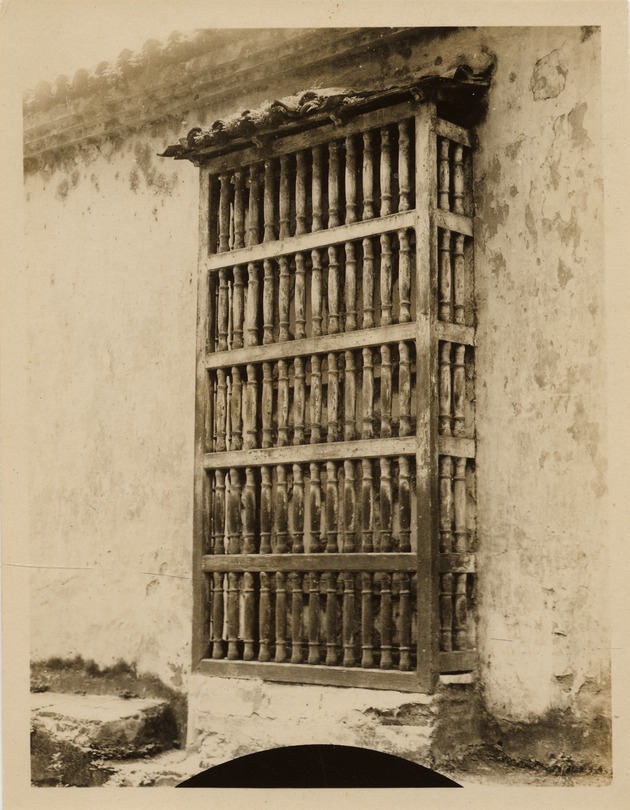 View of barred window, Santiago de Cuba - Recto