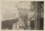 Five women standing on a porch, the House of Sweet Potato Port