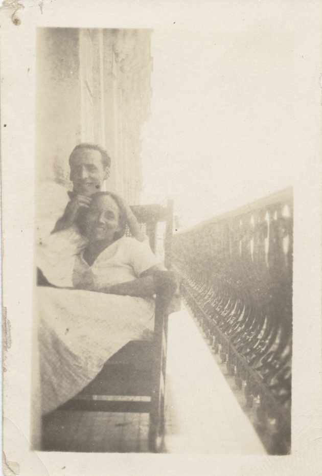 Abril Lamarque and unidentified woman sitting in chair - Recto