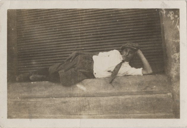 Young Eduardo Abril Lamarque laying on side - Recto