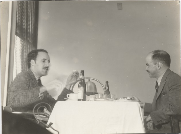 Abril Lamarque (pictured left) eating with unidentified man - Recto