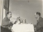 Abril Lamarque (pictured left) eating with unidentified man