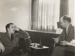 Abril Lamarque (pictured left) and unidentified man talking