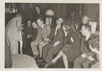 Abril Lamarque (pictured seated left) with a group of unidentified men and women