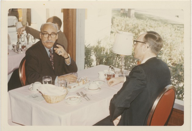 Abril Lamarque eating with unidentified man - Recto