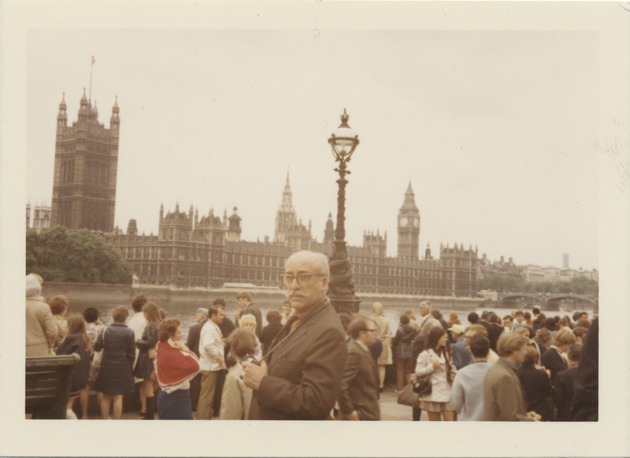 Abril Lamarque standing in front of the Palace of Westminster in London, England - Recto