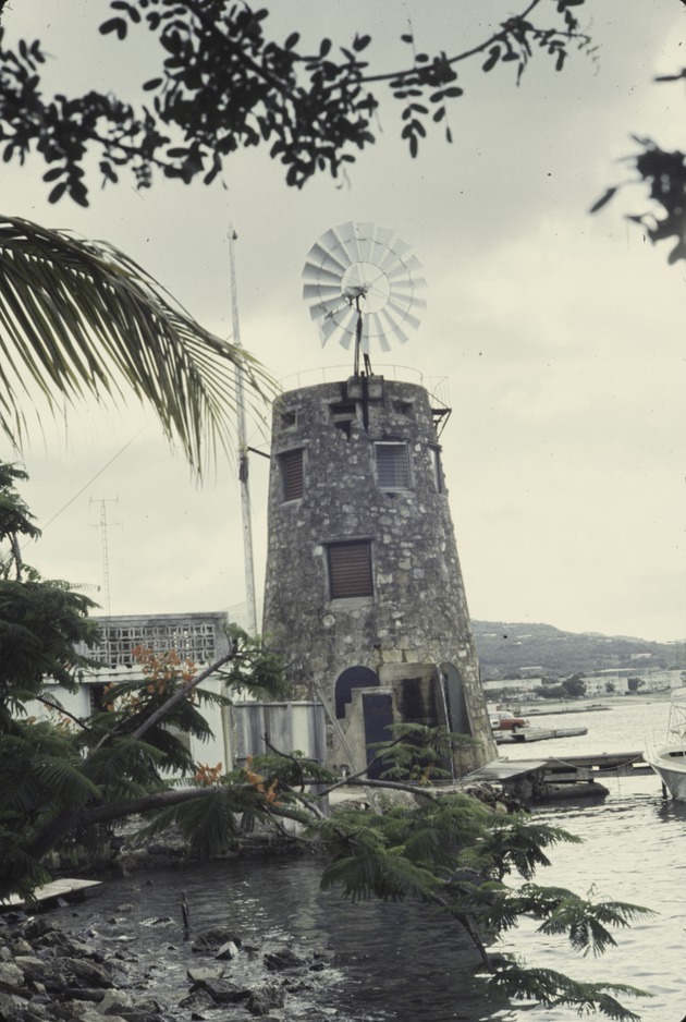 View of boats at a harbor near a windmill, St. Croix, Virgin Islands