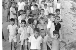 [1965-11] Brazilian children greet Robert F. Kennedy in Manacapuru, Brazil 2
