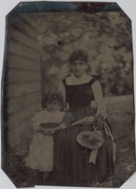 Tintype of woman and young child pictured outside